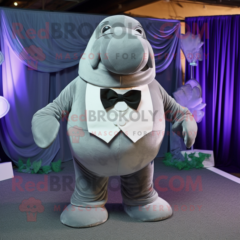 Silver Walrus mascot costume character dressed with a T-Shirt and Bow ties Silver Walrus mascot costume character dressed with a T-Shirt and Bow ties