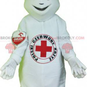 White snowman mascot with a red cross on his stomach -