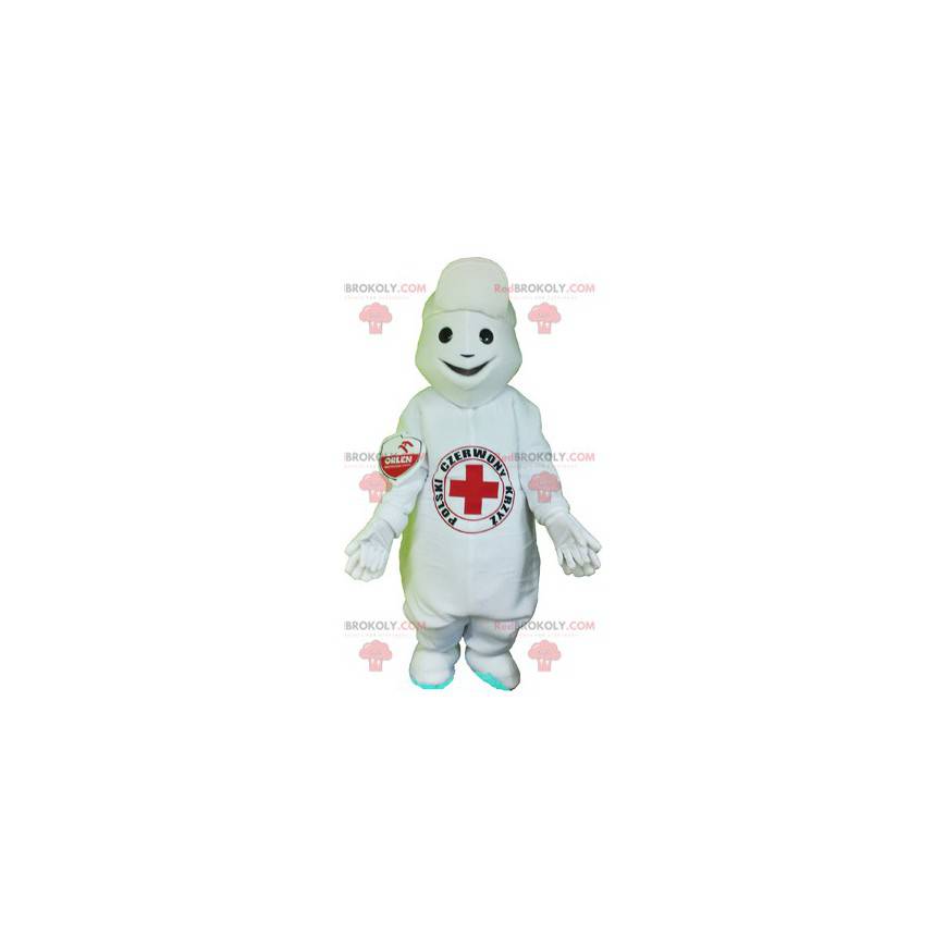 Mascotte de bonhomme blanc avec une croix rouge sur le ventre -