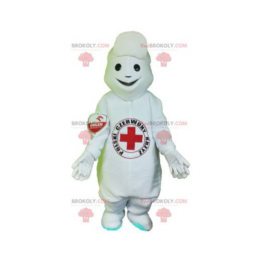 Mascotte de bonhomme blanc avec une croix rouge sur le ventre -