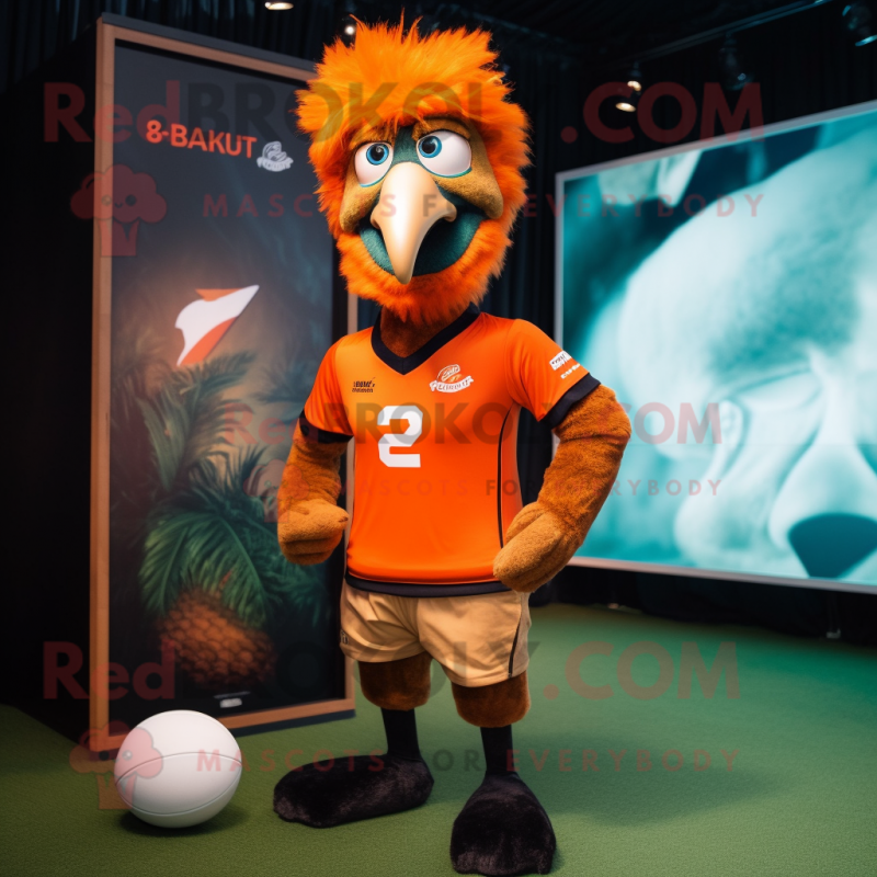 Orange Emu mascot costume character dressed with a Rugby Shirt and Caps Orange Emu mascot costume character dressed with a Rugby Shirt and Caps