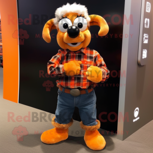 Orange Ram mascot costume character dressed with a Flannel Shirt and Smartwatches