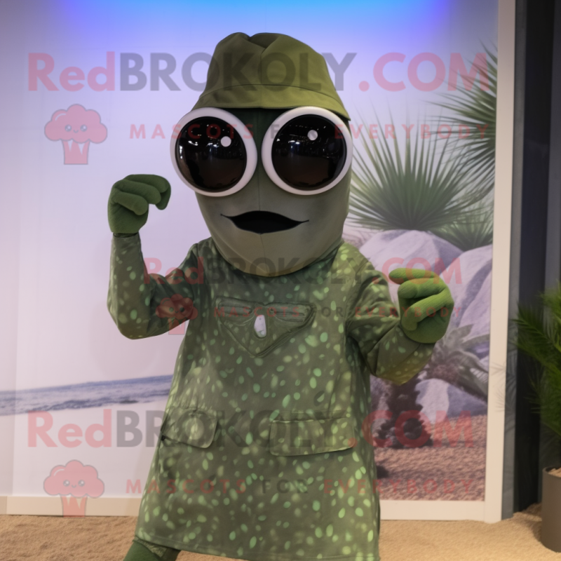 Olive Graveyard mascot costume character dressed with a Bodysuit and Sunglasses Olive Graveyard mascot costume character dressed with a Bodysuit and Sunglasses