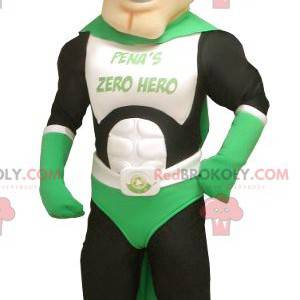 Grünes weißes und schwarzes Superheldenmaskottchen -