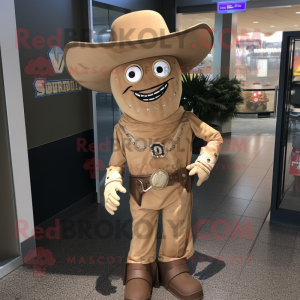 Tan Cowboy mascot costume character dressed with a Jacket and Shawl pins