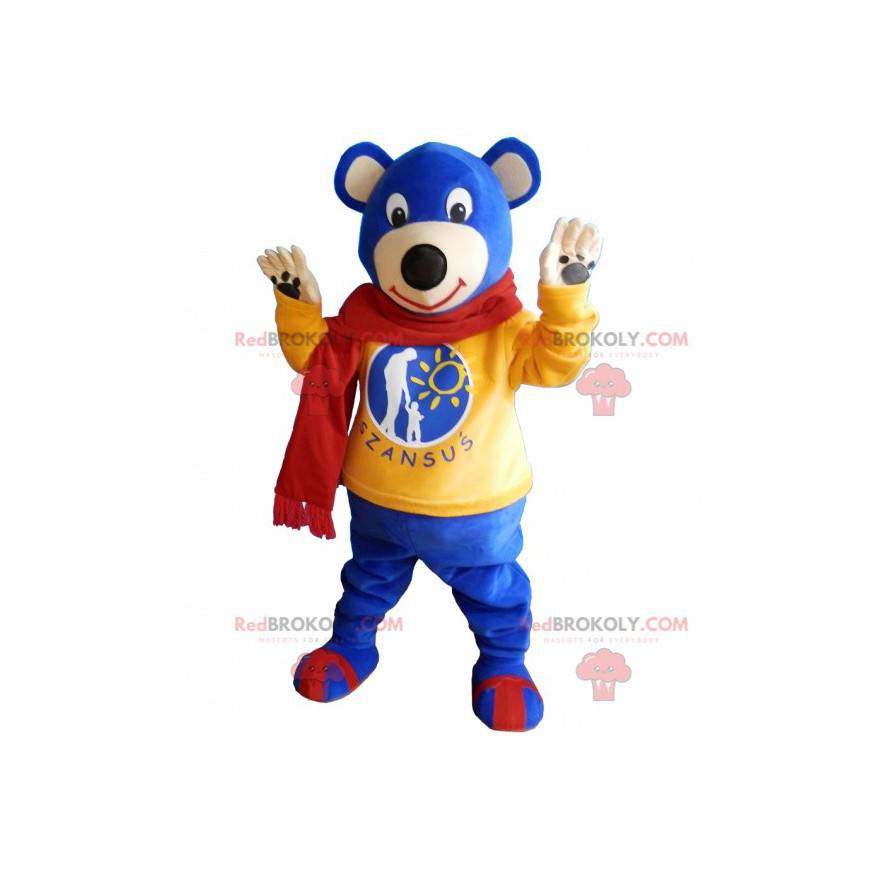 Blaues Teddy-Maskottchen mit gelbem Pullover und Schal -