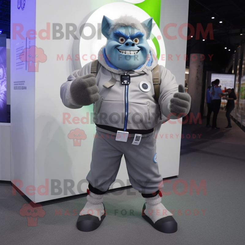 Silver Ogre mascot costume character dressed with a Windbreaker and Smartwatches