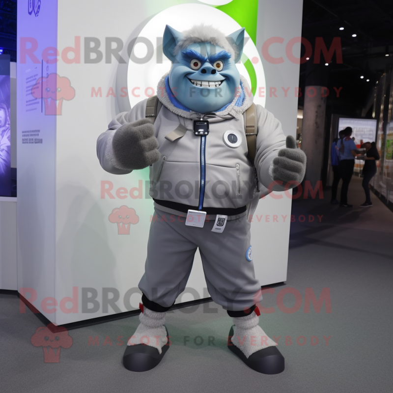 Silver Ogre mascot costume character dressed with a Windbreaker and Smartwatches Silver Ogre mascot costume character dressed with a Windbreaker and Smartwatches