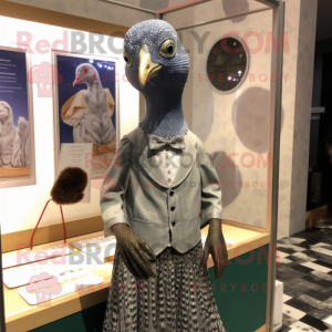 Silver Guinea Fowl mascot costume character dressed with a Shift Dress and Pocket squares