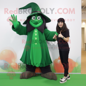 Forest Green Witch mascot costume character dressed with a Capri Pants and Watches