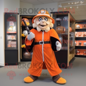 Orange Wizard mascot costume character dressed with a Baseball Tee and Belts