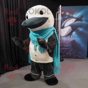 Teal Killer Whale mascot costume character dressed with a Corduroy Pants and Scarves