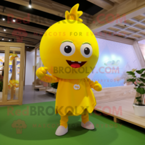 Yellow Plum mascot costume character dressed with a Romper and Anklets