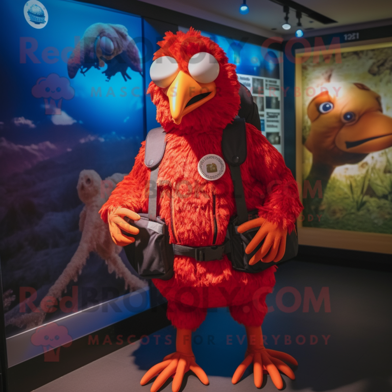 Red Guinea Fowl mascot costume character dressed with a Jumpsuit and Backpacks Red Guinea Fowl mascot costume character dressed with a Jumpsuit and Backpacks
