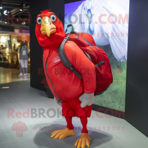 Red Guinea Fowl mascot costume character dressed with a Jumpsuit and Backpacks