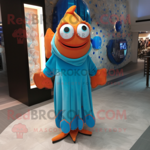 Cyan Clown Fish mascot costume character dressed with a Turtleneck and Shawl pins