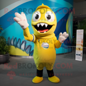 Lemon Yellow Barracuda mascot costume character dressed with a Graphic Tee and Mittens