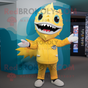 Lemon Yellow Barracuda mascot costume character dressed with a Graphic Tee and Mittens