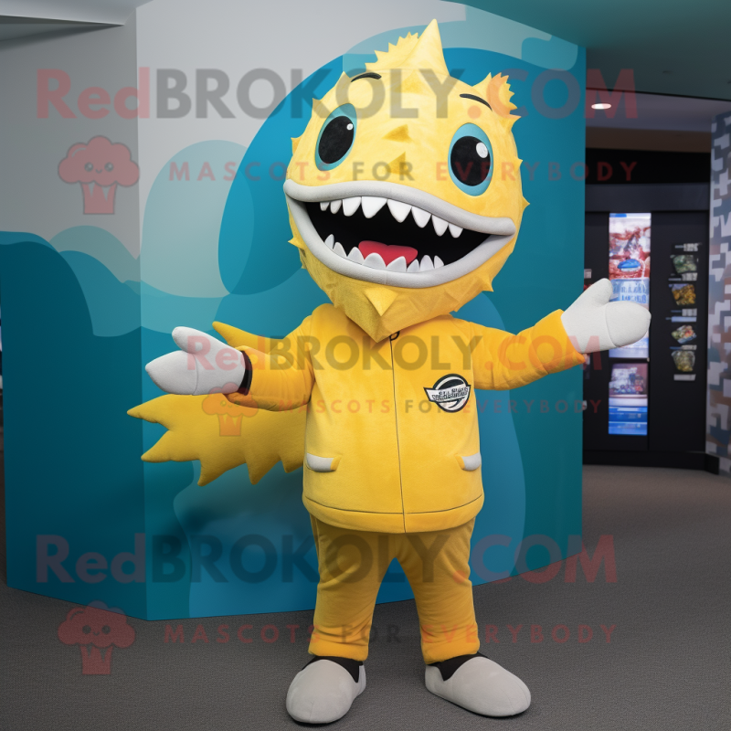 Lemon Yellow Barracuda mascot costume character dressed with a Graphic Tee and Mittens Lemon Yellow Barracuda mascot costume character dressed with a Graphic Tee and Mittens