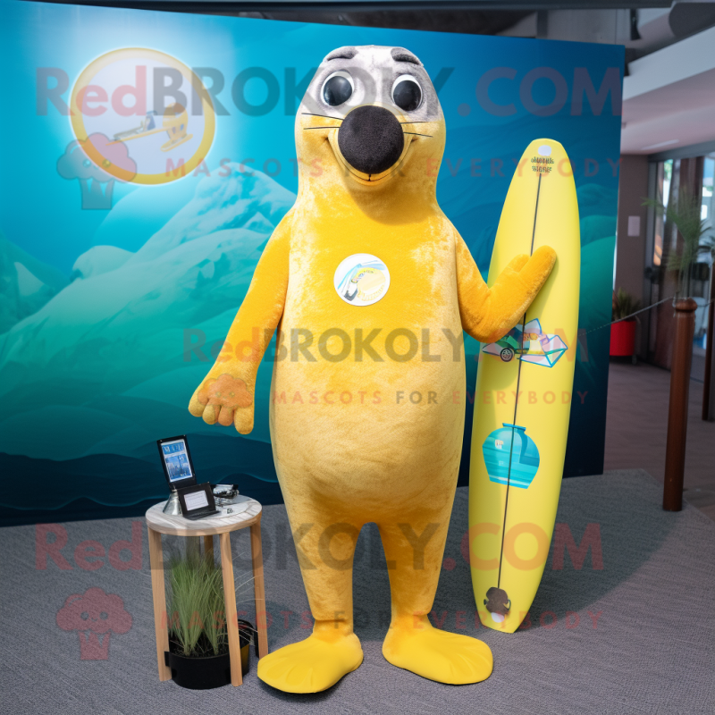 Yellow Seal mascot costume character dressed with a Board Shorts and Mittens