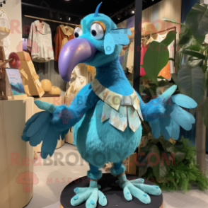 Turquoise Dodo Bird mascot costume character dressed with a Chinos and Brooches