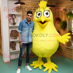 Lemon Yellow Tandoori Chicken mascot costume character dressed with a Boyfriend Jeans and Bracelet watches