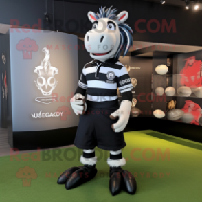 Black Quagga mascot costume character dressed with a Rugby Shirt and Lapel pins