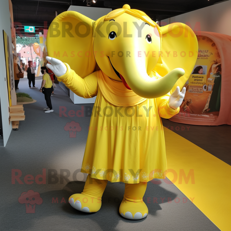 Yellow Elephant mascot costume character dressed with a Maxi Dress and Foot pads