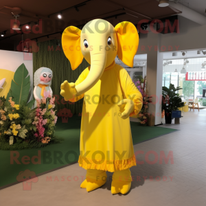 Yellow Elephant mascot costume character dressed with a Maxi Dress and Foot pads