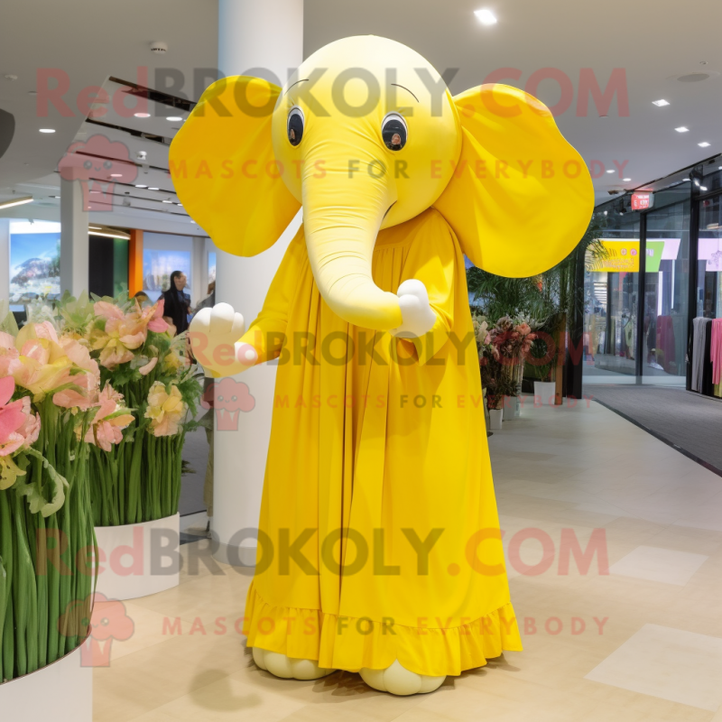 Yellow Elephant mascot costume character dressed with a Maxi Dress and Foot pads