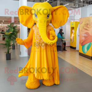 Yellow Elephant mascot costume character dressed with a Maxi Dress and Foot pads