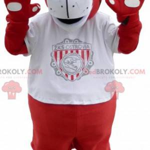 Mascote tigre vermelho e branco em roupas esportivas -