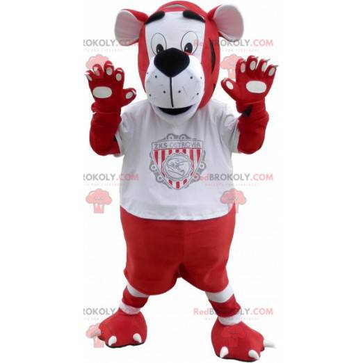 Mascotte de tigre rouge et blanc en tenue de sport -