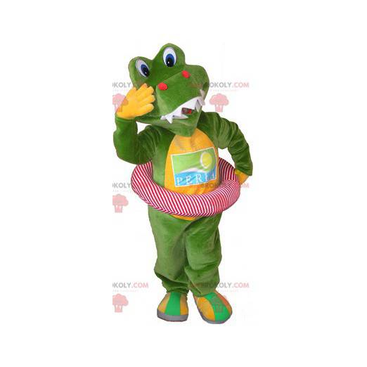 Mascota de cocodrilo verde y amarillo con una boya -