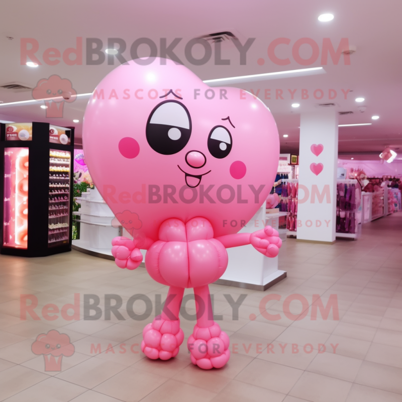 Pink Heart Shaped Balloons mascot costume character dressed with a Mini Dress and Anklets Pink Heart Shaped Balloons mascot costume character dressed with a Mini Dress and Anklets