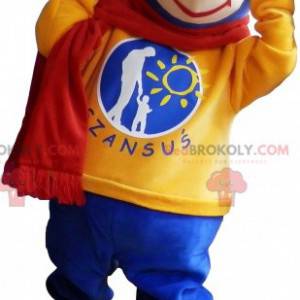 Blaues Teddy-Maskottchen mit gelbem Pullover und Schal -