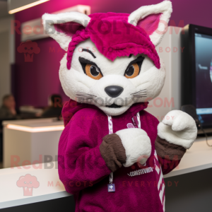 Magenta Bobcat mascot costume character dressed with a Cardigan and Beanies