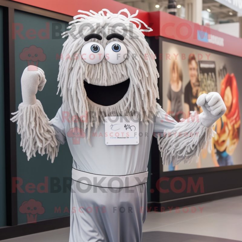 Silver Spaghetti mascot costume character dressed with a T-Shirt and Digital watches