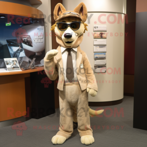 Beige Dingo mascot costume character dressed with a Suit Jacket and Eyeglasses