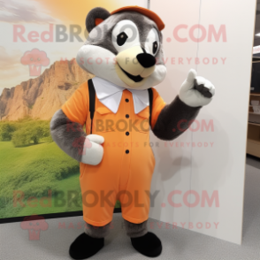 Peach Badger mascot costume character dressed with a Jumpsuit and Tie pins