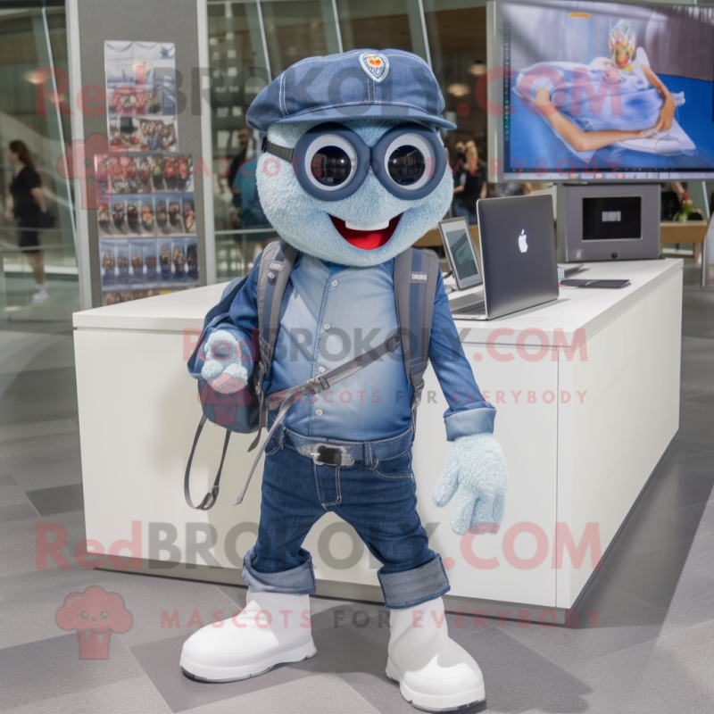 Navy Computer mascot costume character dressed with a Chambray Shirt and Backpacks