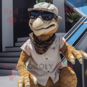 Tan Utahraptor mascot costume character dressed with a Trousers and Sunglasses