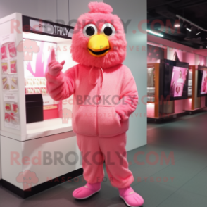 Pink Fried Chicken mascot costume character dressed with a Hoodie and Shoe laces
