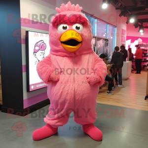 Pink Fried Chicken mascot costume character dressed with a Hoodie and Shoe laces