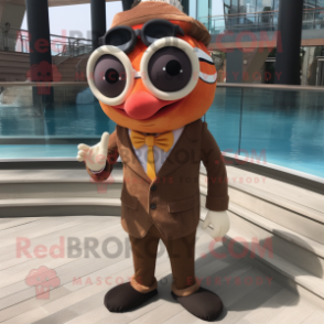 Brown Clown Fish mascot costume character dressed with a Blazer and Sunglasses