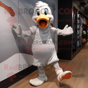 Gray Geese mascot costume character dressed with a Running Shorts and Gloves