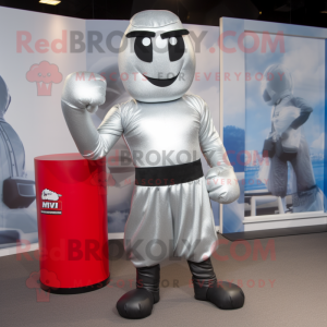 Silver Boxing Glove mascot costume character dressed with a Skinny Jeans and Headbands