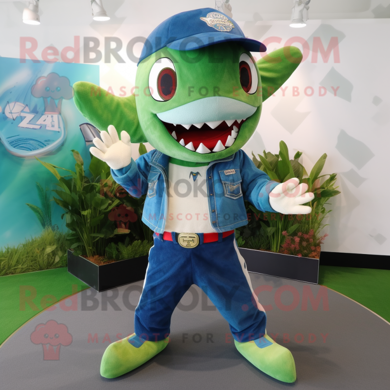 Green Shark mascot costume character dressed with a Denim Shorts and Brooches