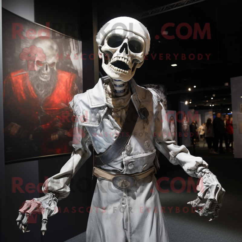Silver Undead mascot costume character dressed with a Coat and Suspenders Silver Undead mascot costume character dressed with a Coat and Suspenders