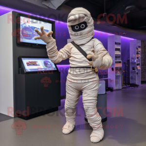 Lavender Mummy mascot costume character dressed with a Jumpsuit and Digital watches